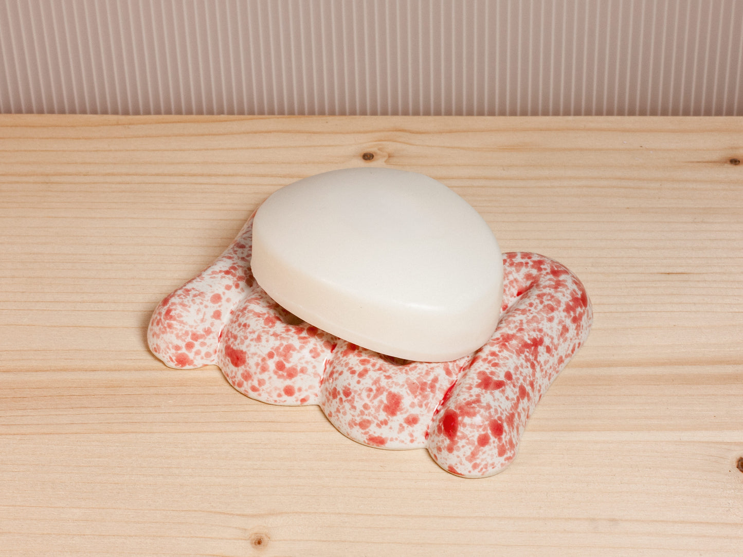 Pink and white ceramic soap dish