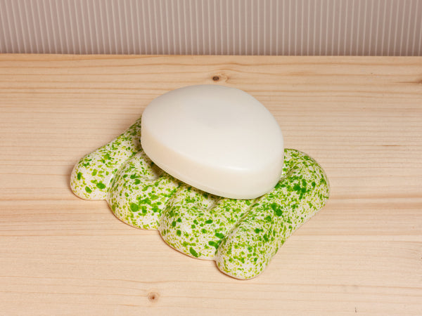 Green and white ceramic soap dish